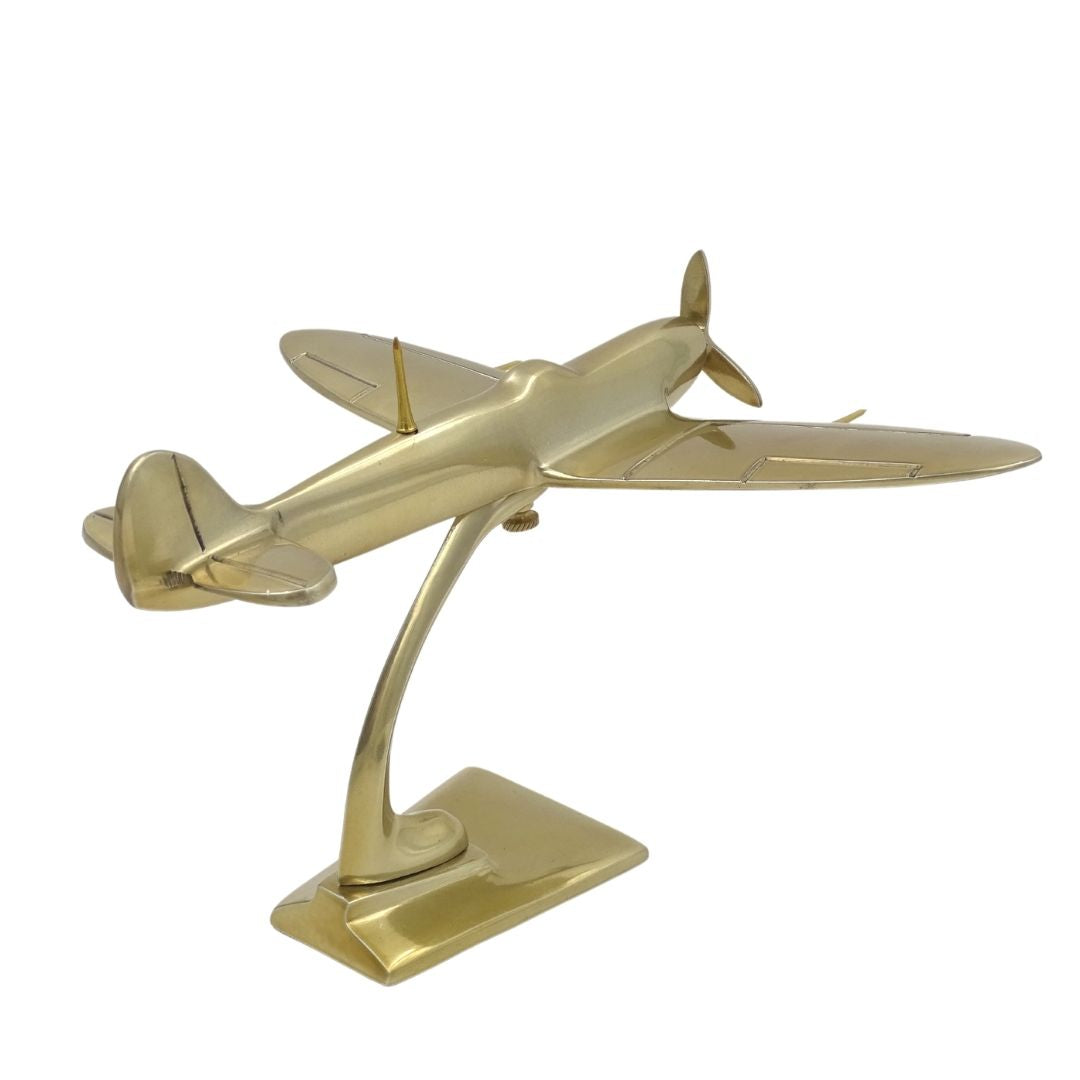 Modelo de caça Spitfire em alumínio cor dourada, com possibilidade de personalização por gravação
