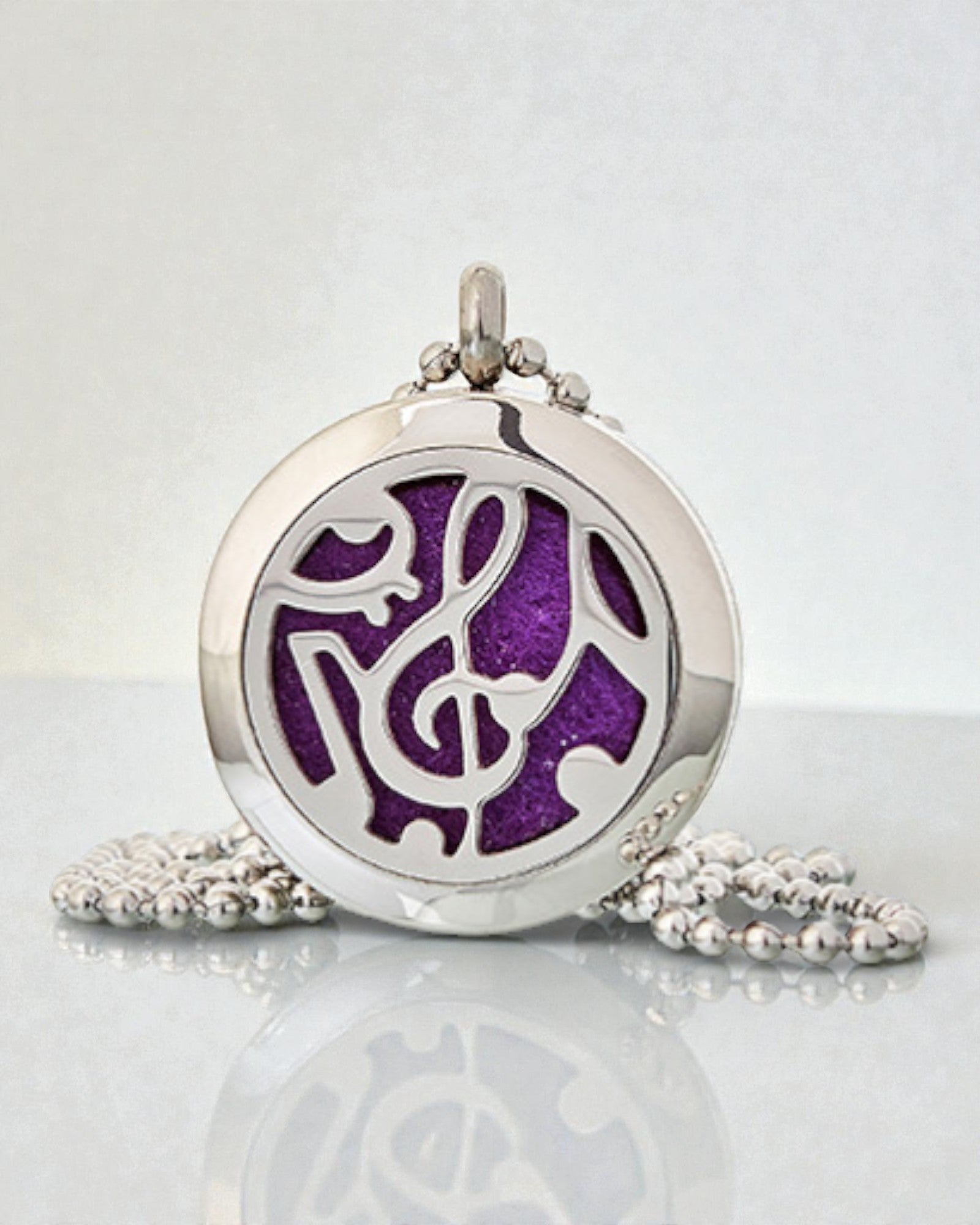 Sinfonia do Aroma – Colar de Aromaterapia com Motivo de Notas Musicais 25 mm