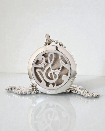 Sinfonia do Aroma – Colar de Aromaterapia com Motivo de Notas Musicais 25 mm